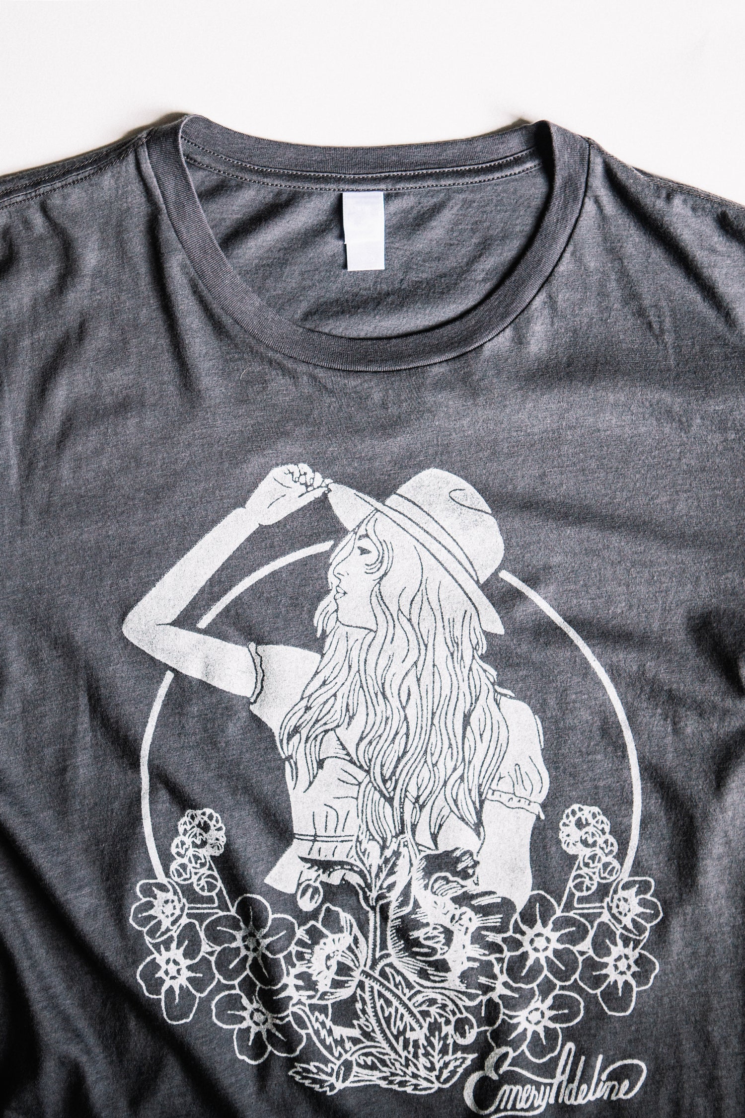 close up on emery adeline cowgirl logo grey tshirt